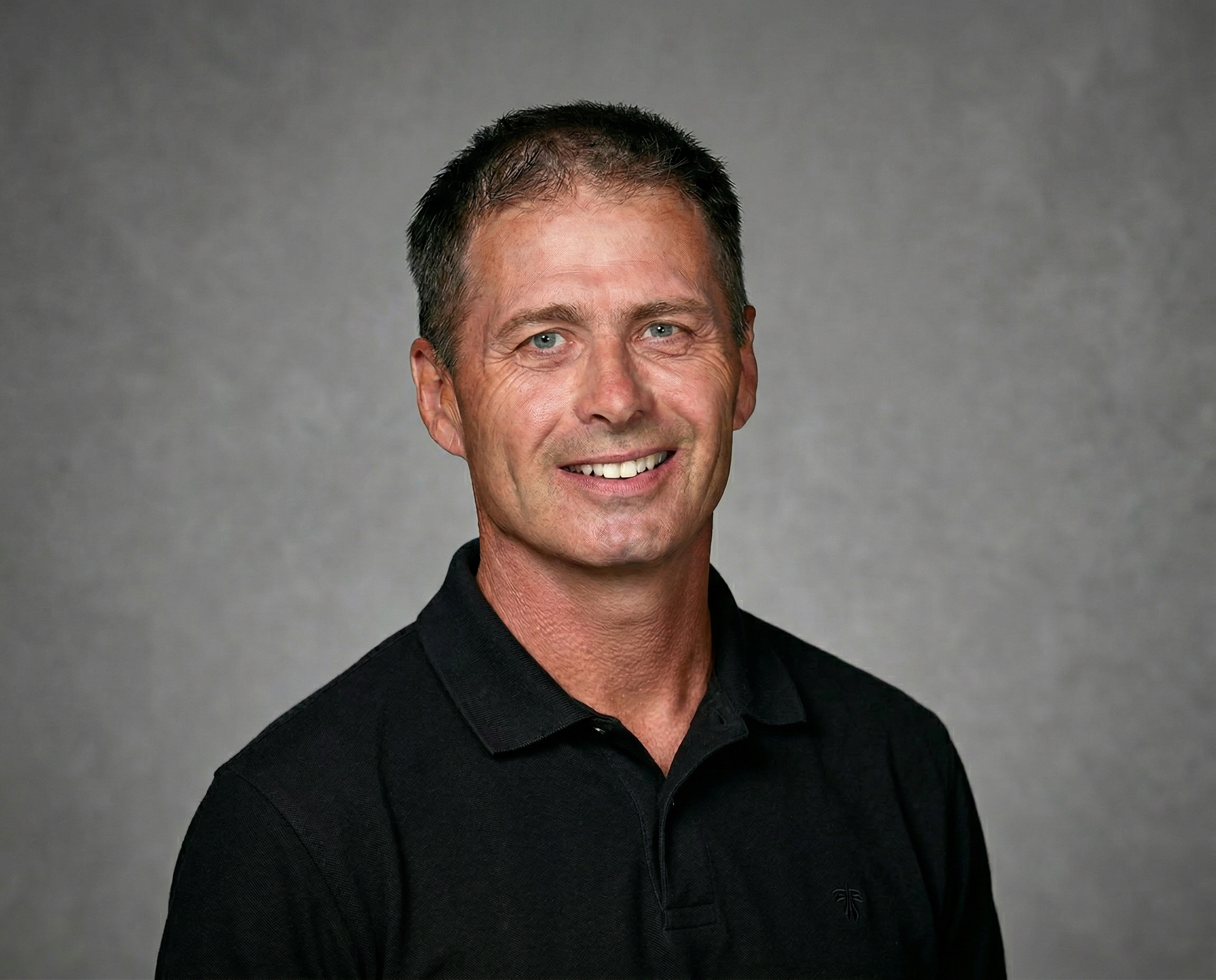 MarkDean-HeadshotProMarch2026.jpg