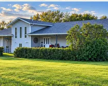 Brightened_House_Front_2-1.jpg